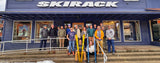 Skirack staff in front of the store